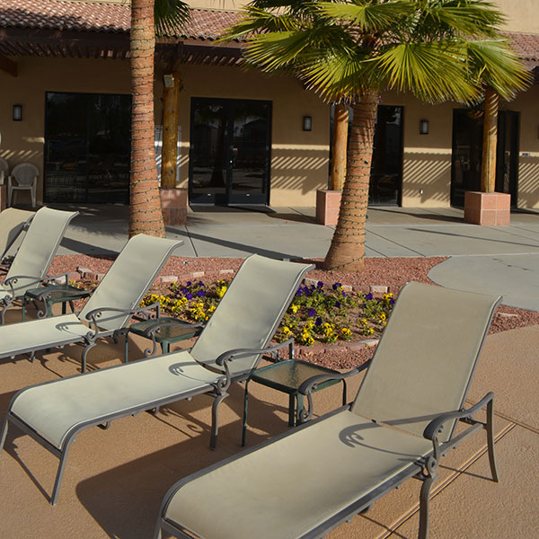 Lounge chairs along the pool