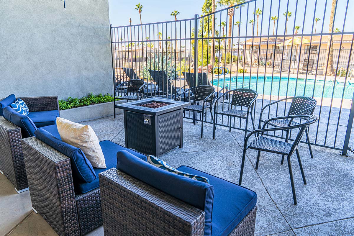 Gas fire-pit around outside seating at El Dorado's clubhouse