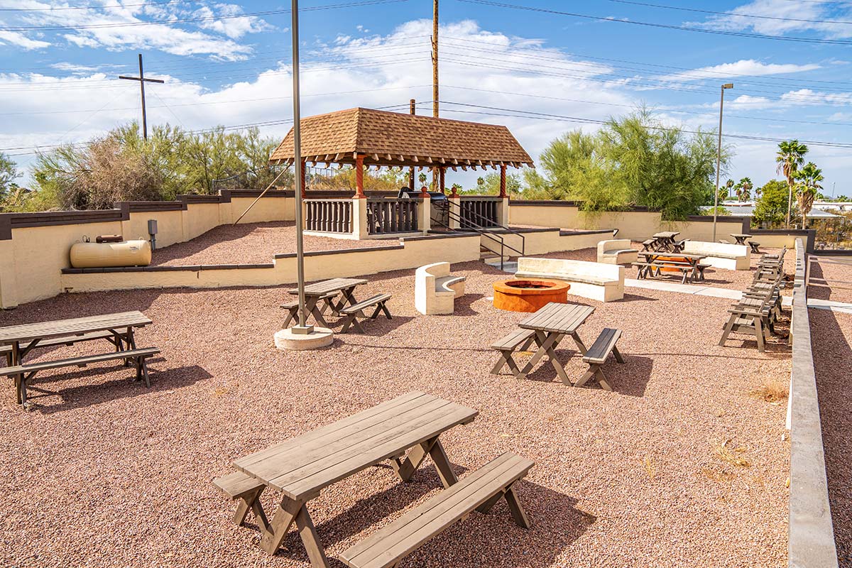 Picnic tables and fire-pit at Superstition Lookout RV Resort